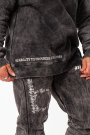 Distressed Black Pocket Sweater – The Ability to Progress At All Costs