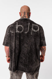Distressed Black Tee – The Ability to Progress At All Costs